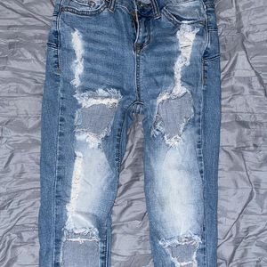 light washed distressed skinny jeans